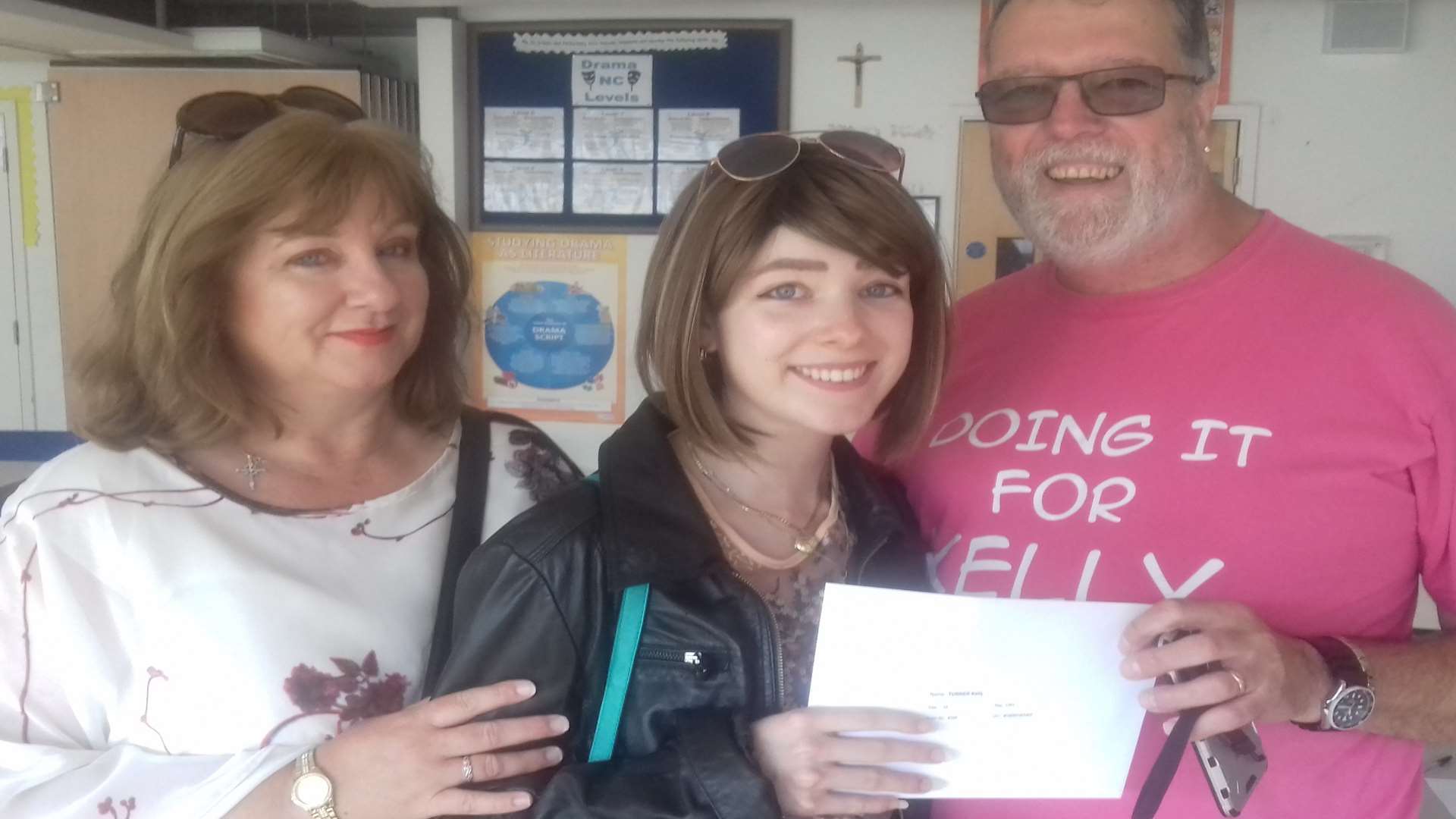 Kelly Turner and her parents Linda and Martin, with her exam results. Picture courtesy of St Edmund's School, Dover