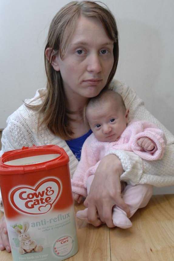Julie Wakeling, with baby Shakayla, found a needle in a tin of Cow & Gate milk formula