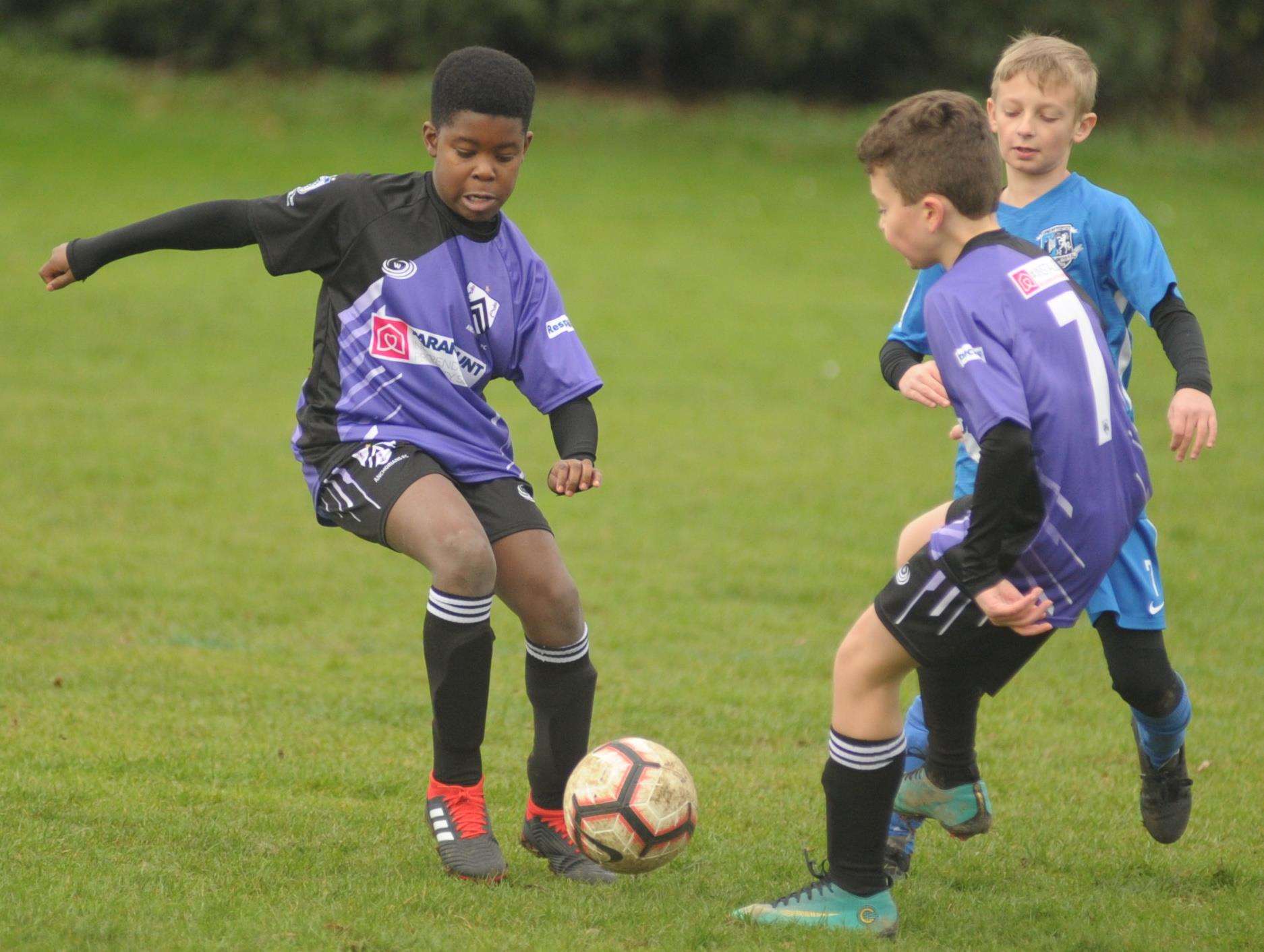 Anchorians Panthers under-10s on the ball against Medway United North under-10s. Picture: Steve Crispe FM6473918