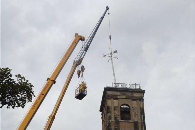 Removal of the weather vane from the tower of St Paul's Dockyard Church at Sheerness