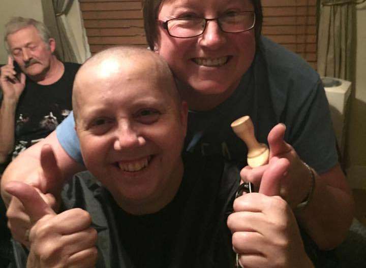 Mel Tullett, from Rochester had all her hair shaved off to raise money for cancer charities, with hairdresser Elsie Reeves.