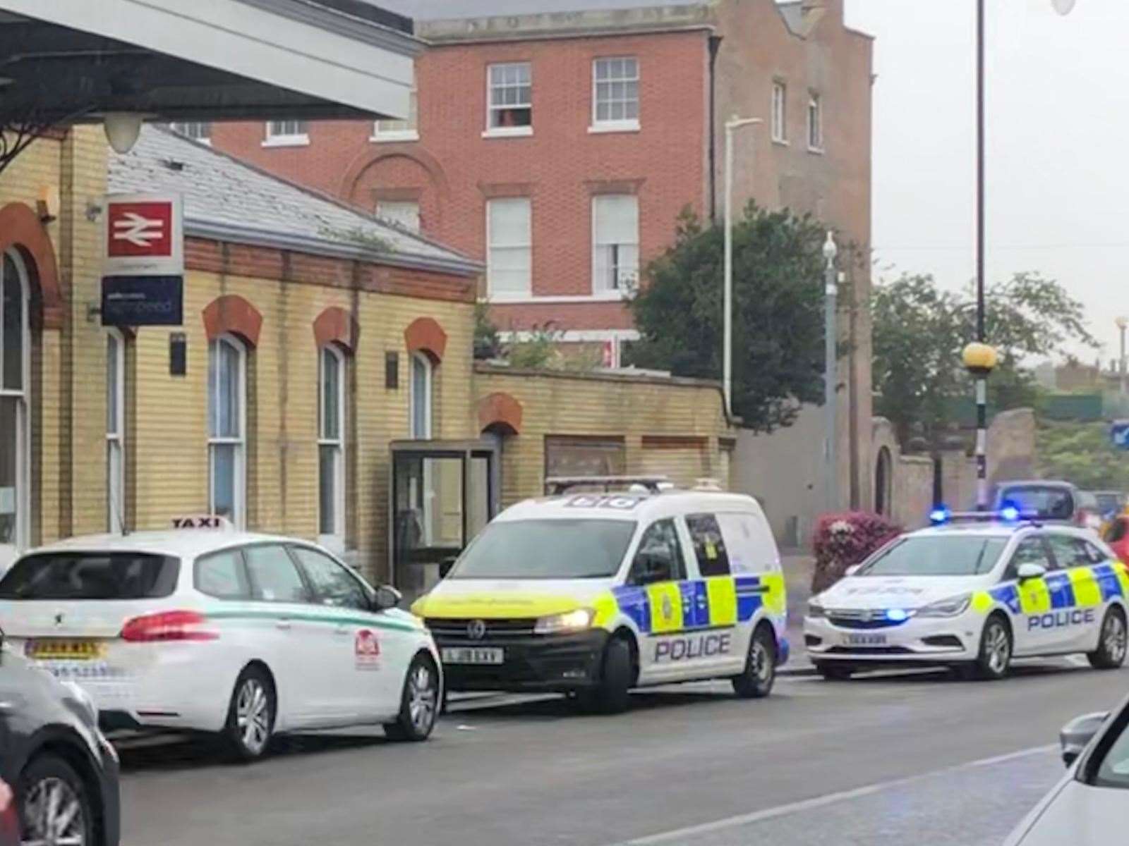 Police vehicles at Faversham station this afternoon