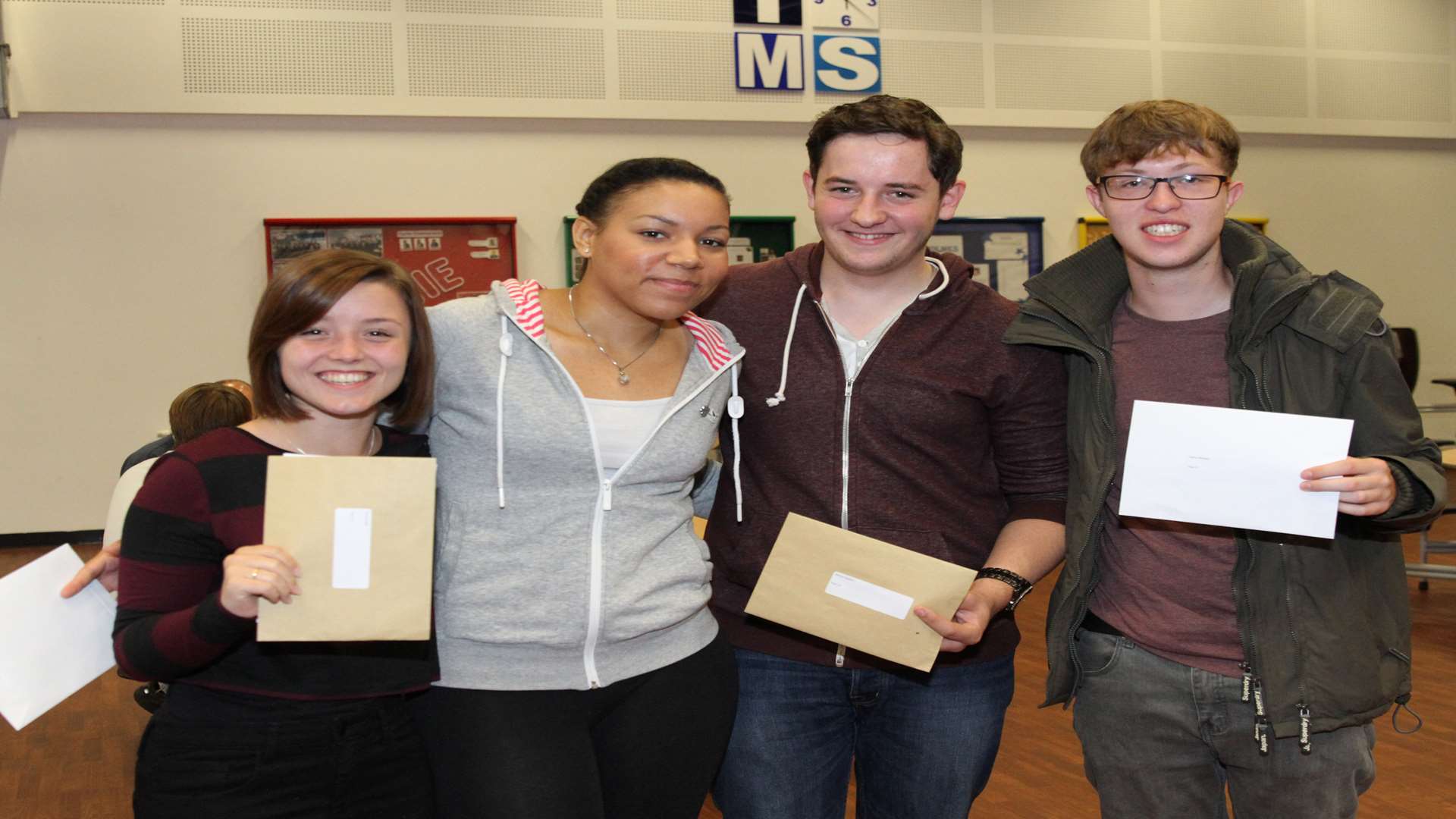 Malling School pupils Jessica Ball, Sophie Bennet, Danny Hogben and Harry Meader with their results