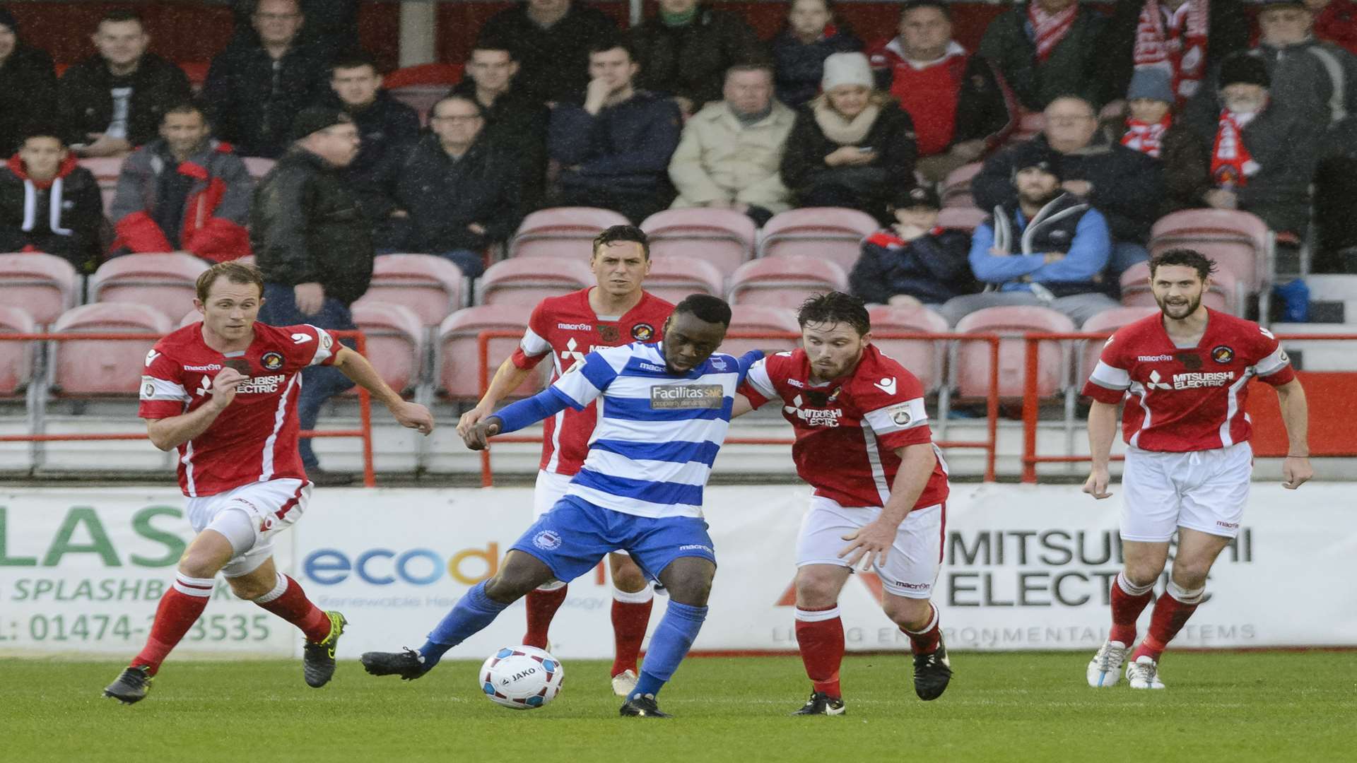 Four players try to win the ball back for Ebbsfleet Picture: Andy Payton