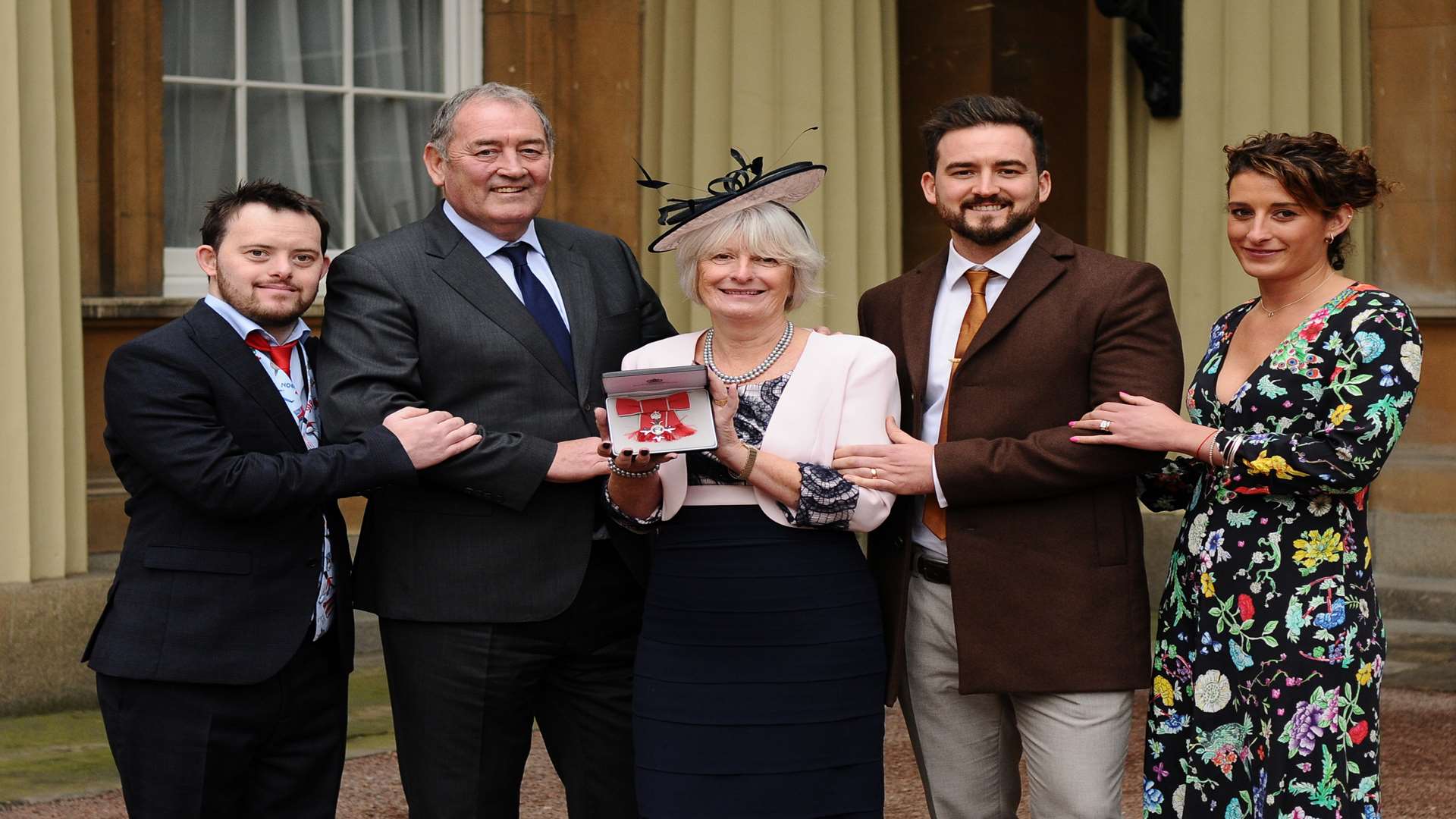 Sue Clarke MBE with son Jamie, husband Tom, son Scott and daughter Kimberley.