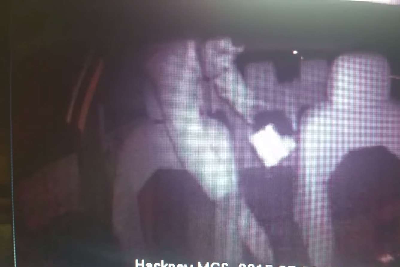 A still from CCTV from inside the taxi