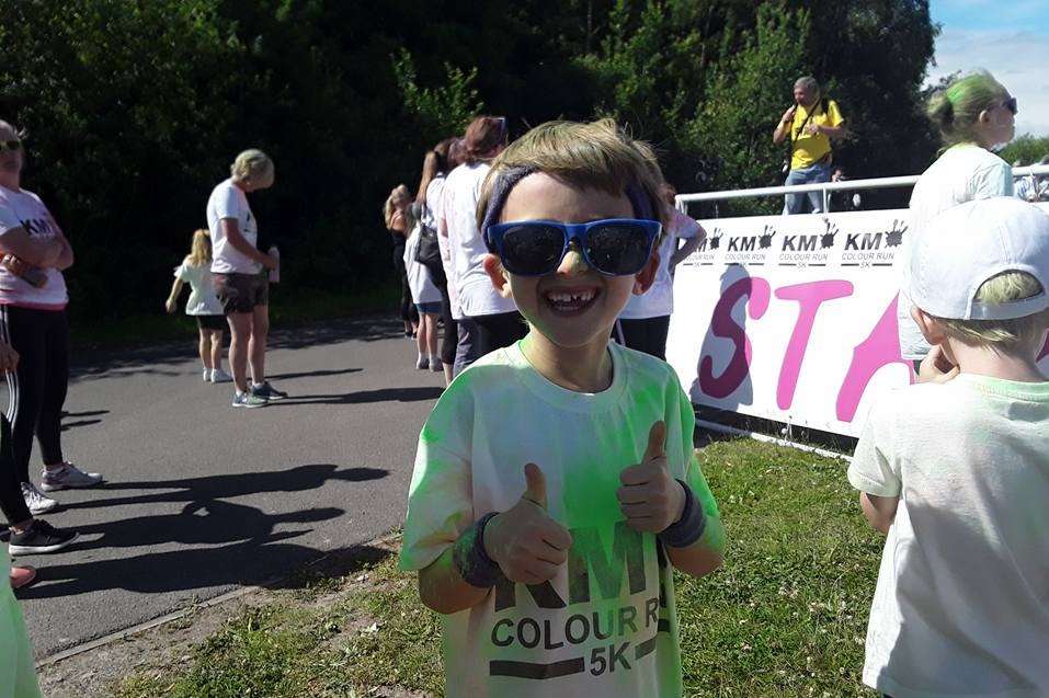 Ewan Freeman, 7, from St Mary's, Whitstable was biggest individual fundraiser at the KM Colour Run.