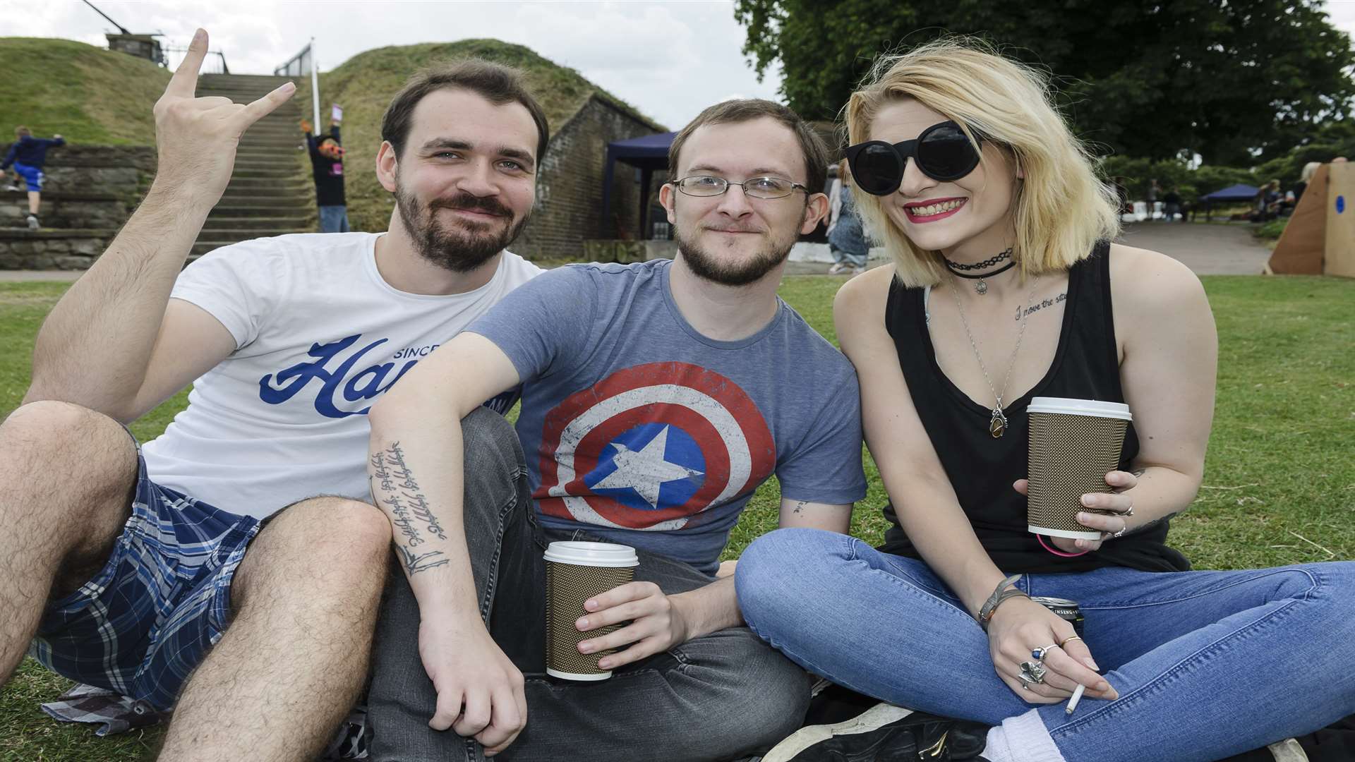 From left, Denver White, Adam James, and Amber Fox enjoy the festival. Picture: Andy Payton