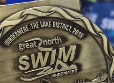 Sharon's medal for completing swim