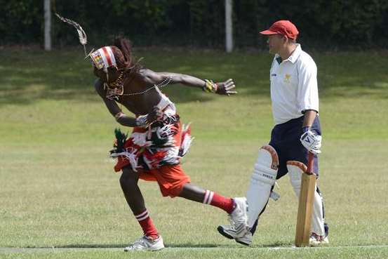 Cricketing Maasai warriors wore traditional clothing and headgear