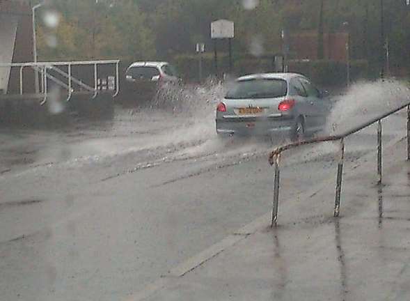 Bradford Street in Tonbridge is under inches of water this morning. Picture: @JustJane1963