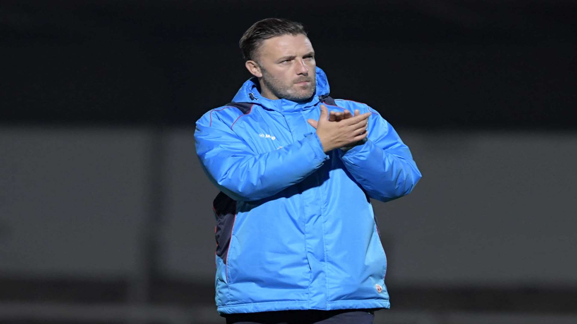 Maidstone manager Jay Saunders thanks away fans at Spotland Picture: Barry Goodwin
