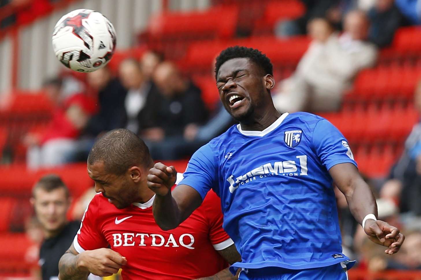 Deji Oshilaja up against Charlton's Josh Magennis at The Valley Picture: Andy Jones