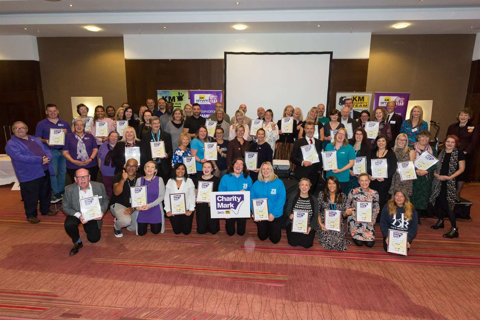 KM Charity Mark 2019 winners plus supporters at the KM Charity Team’s annual forum at the Ashford International Hotel.