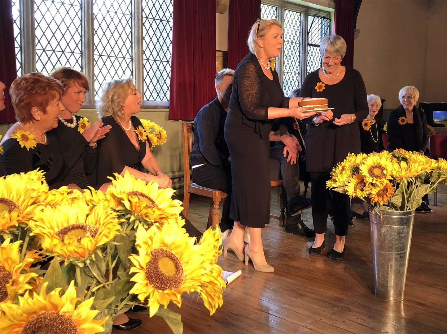 Fern Britton is presented with a cake by one of the original Calendar Girls (2043548)