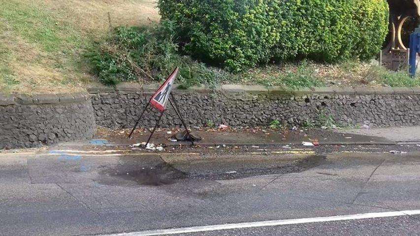 The water leak caused damage to the road