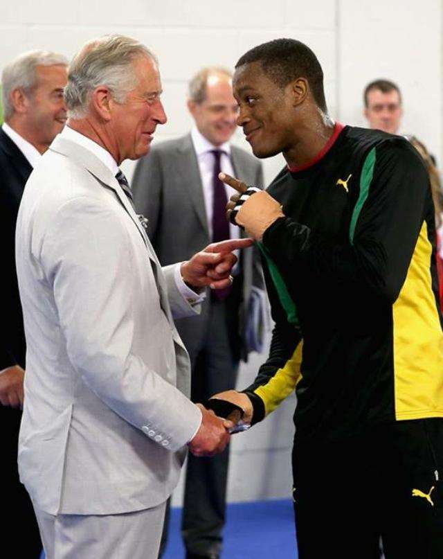 Chev and Prince Charles exchange a joke during a training session at the Games in Glasgow.