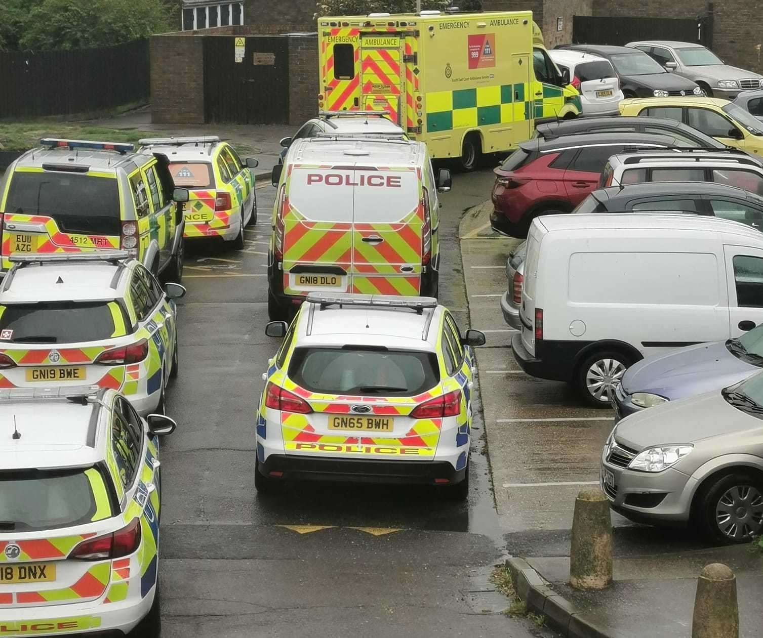 Pictures shared online show as many as eight emergency service vehicles outside the tower block