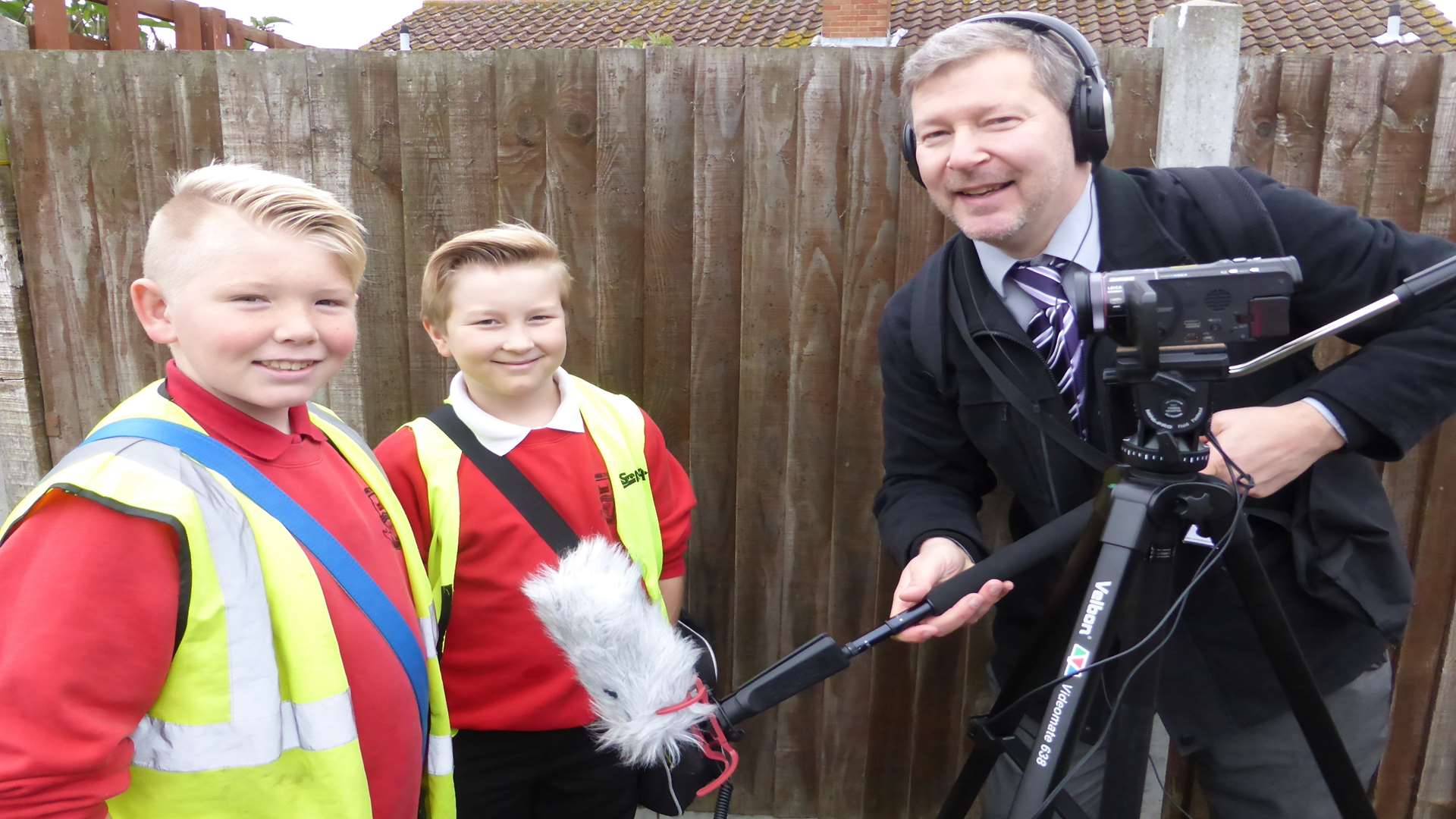 Monkton Primary School's walking bus 10th anniversary celebrations were captured on video by Simon Dolby of KM Walk to School. Pictured with pupils Jasper Marsh and Harry Faulkner, both 10.