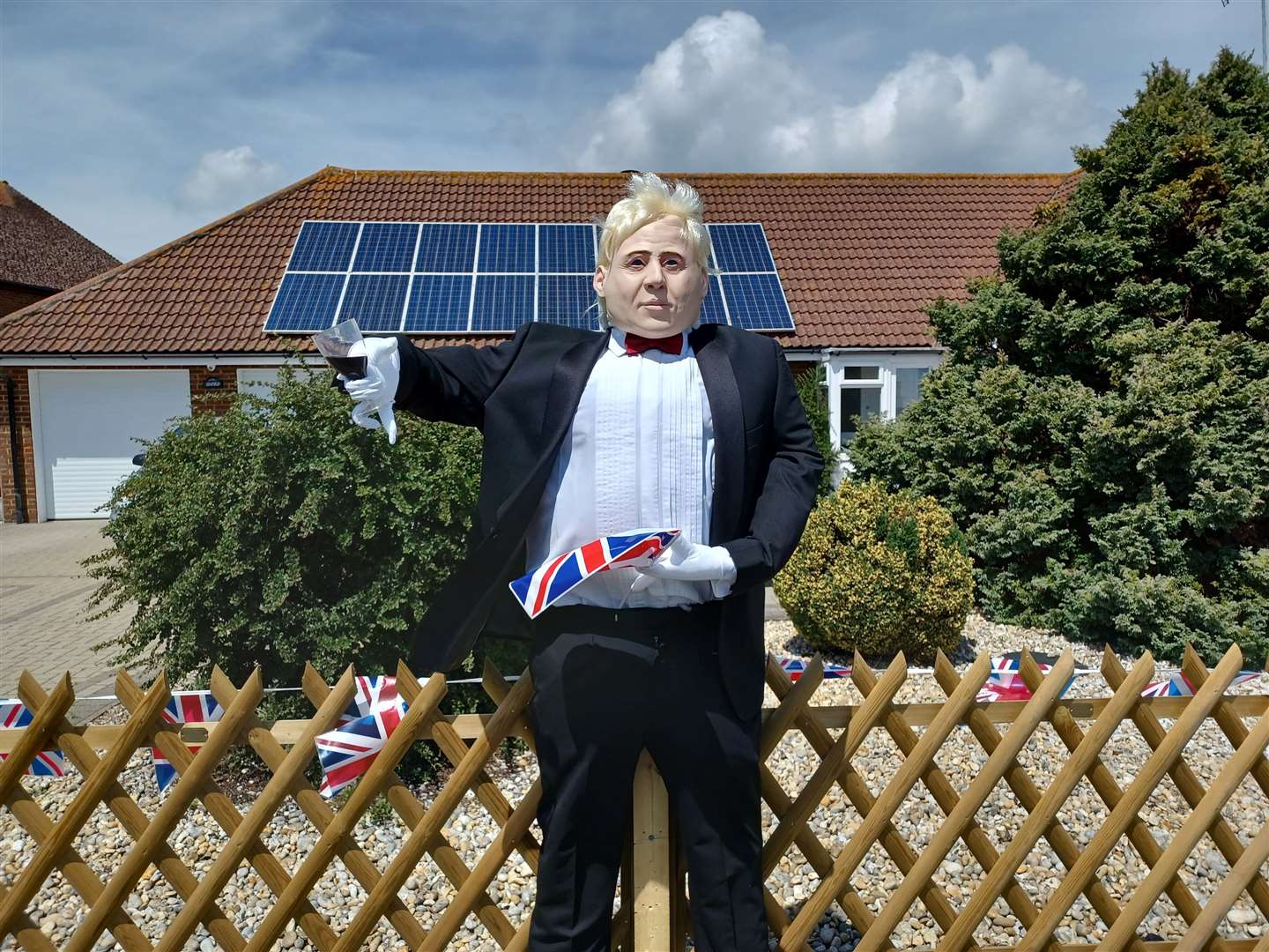 A Boris Johnson scarecrow on West Hythe Road, West Hythe, for the Queen's Platinum Jubilee