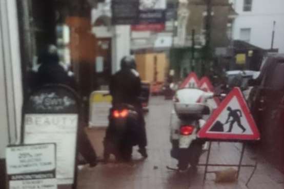 The thieves escaping on scooters. Picture: Charlie Simpson