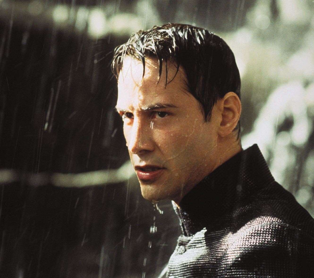 Keanu Reeves in one of the trilogy, The Matrix Revolutions by Warner Bros