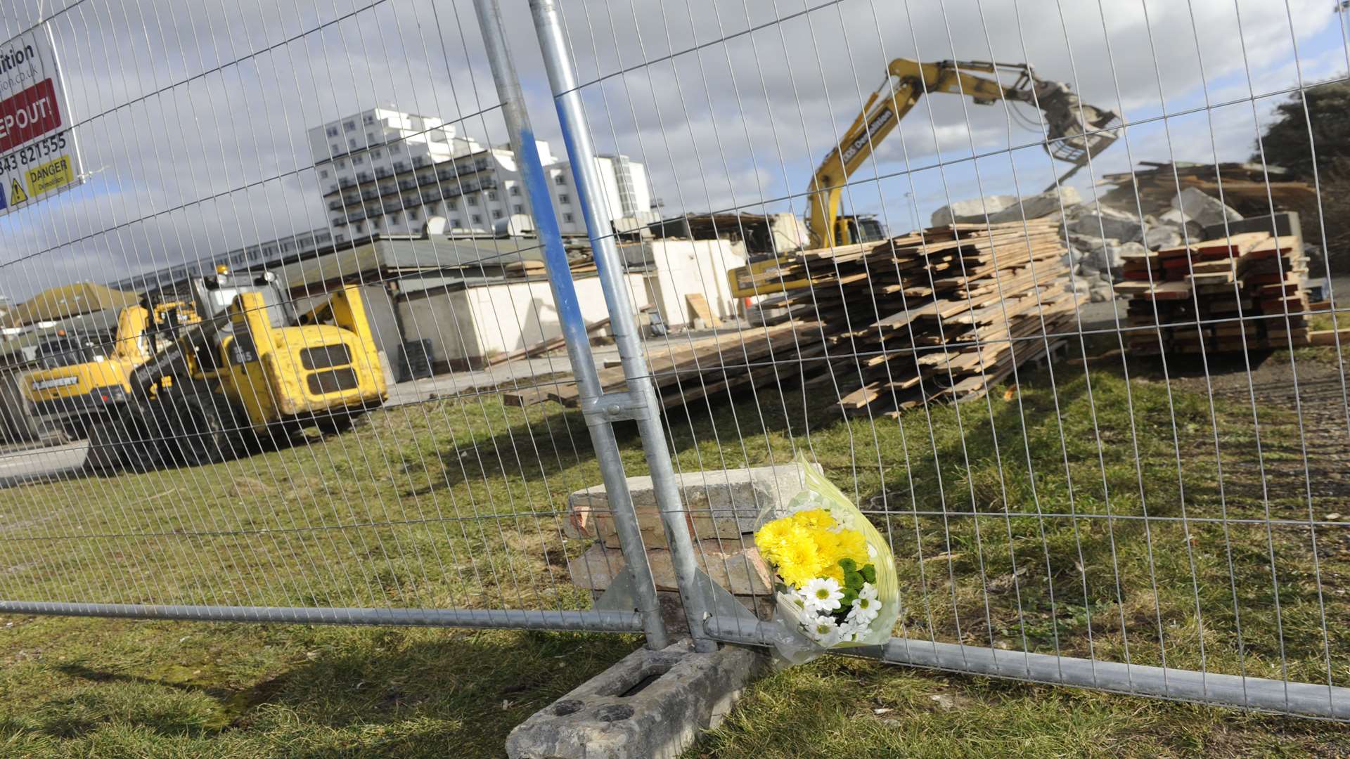 Floral tributes were left to The Priz as demolition started in the week before the fire. Picture: Tony Flashman
