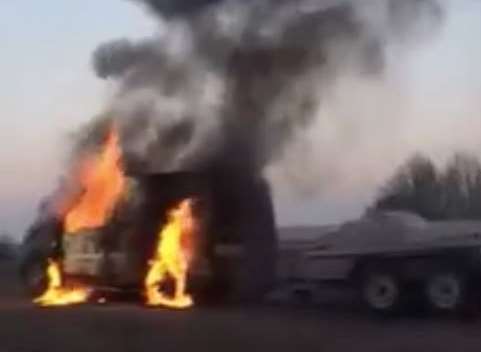 The burning van