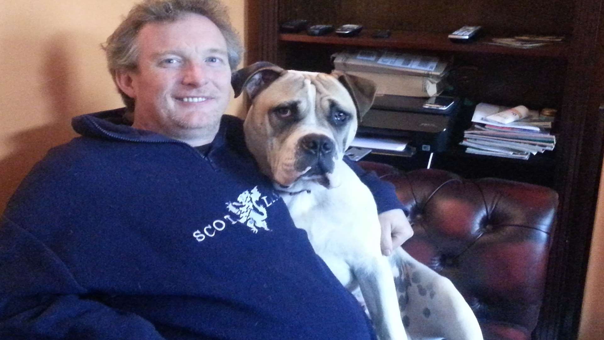 Gareth Davies at home in Strood with his dog Alfie