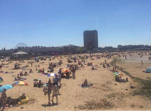 People soak up the sun on Margate's main sands