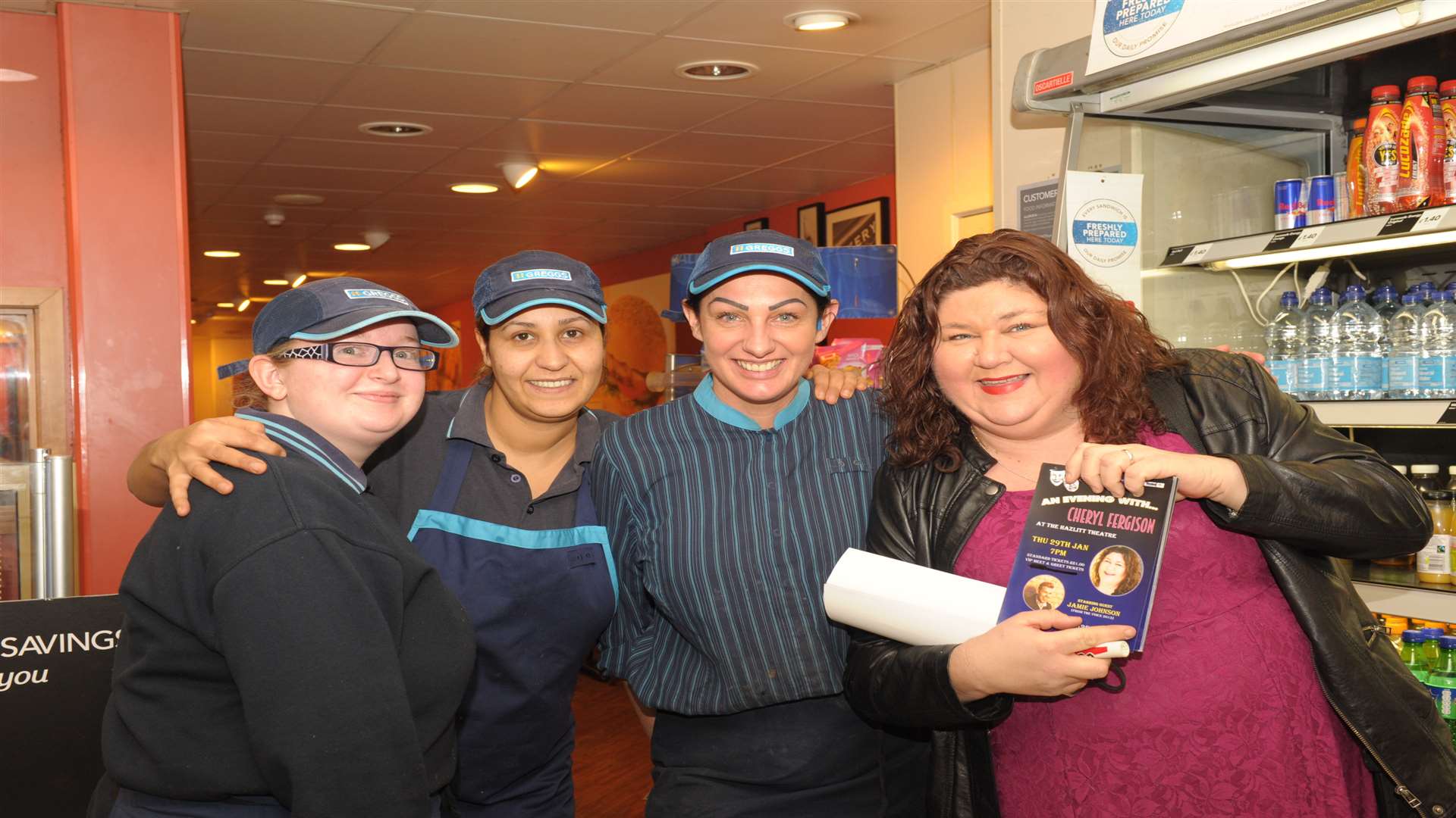 Cheryl with the girls from Greggs: Nicola Rooke, Awatet Wady and Rachel Banks