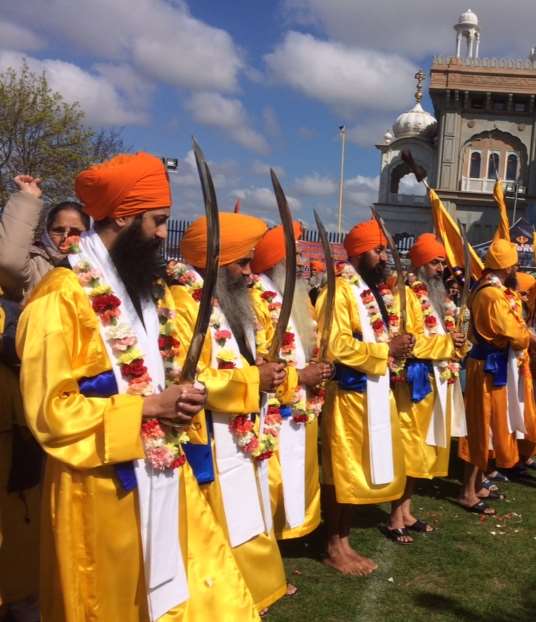 Sikh men in ceremonial dress during Vaisakhi celebrations at the Guru Nanak Darbar Gurdwara in Gravesend