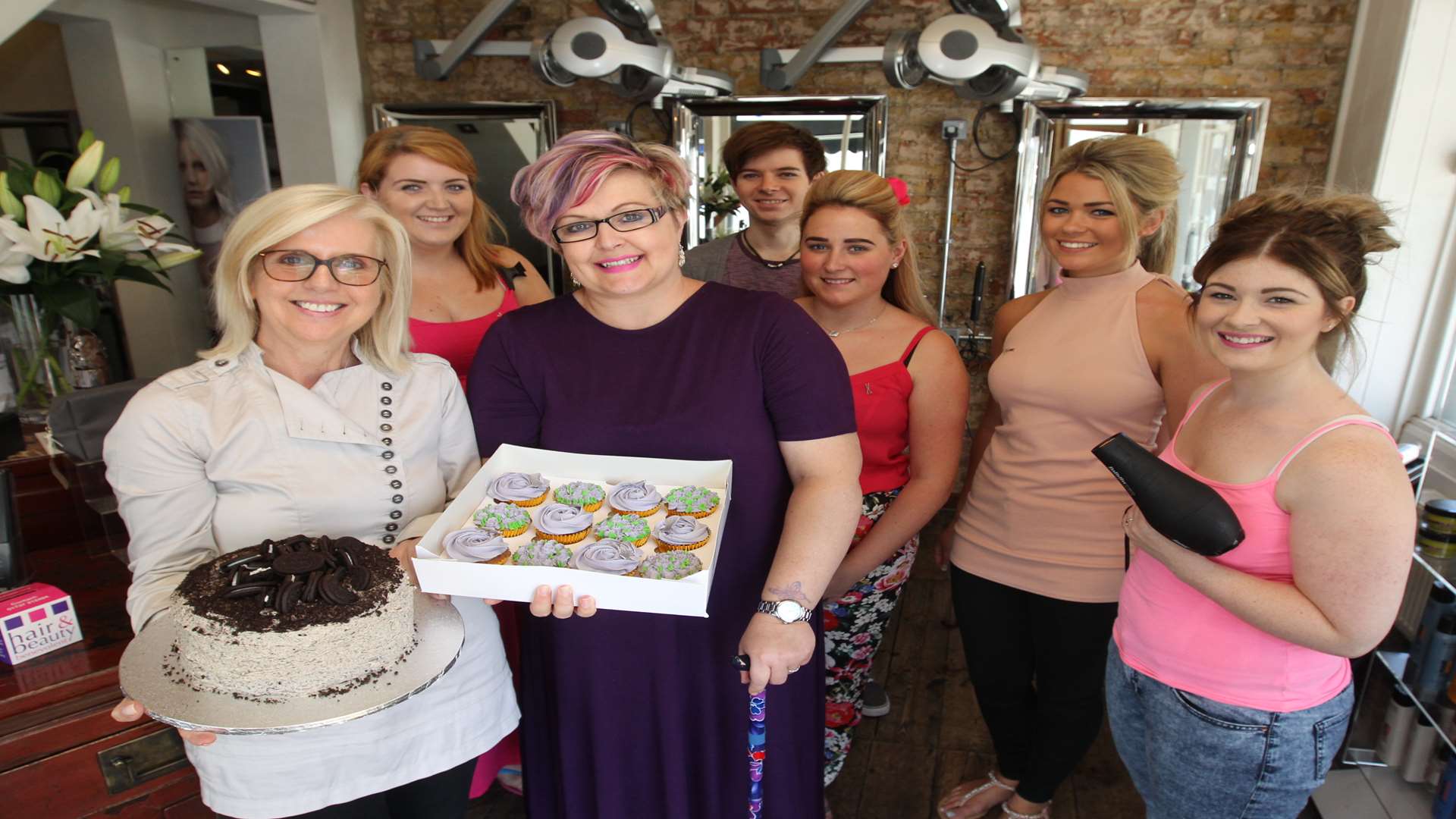 From left, Jackie Mathis, Owner and Katie Barnes, former employee and team members of JM Hairdressers in Gravesend during a Fundraising Day for Katie, who has a brain tumour.