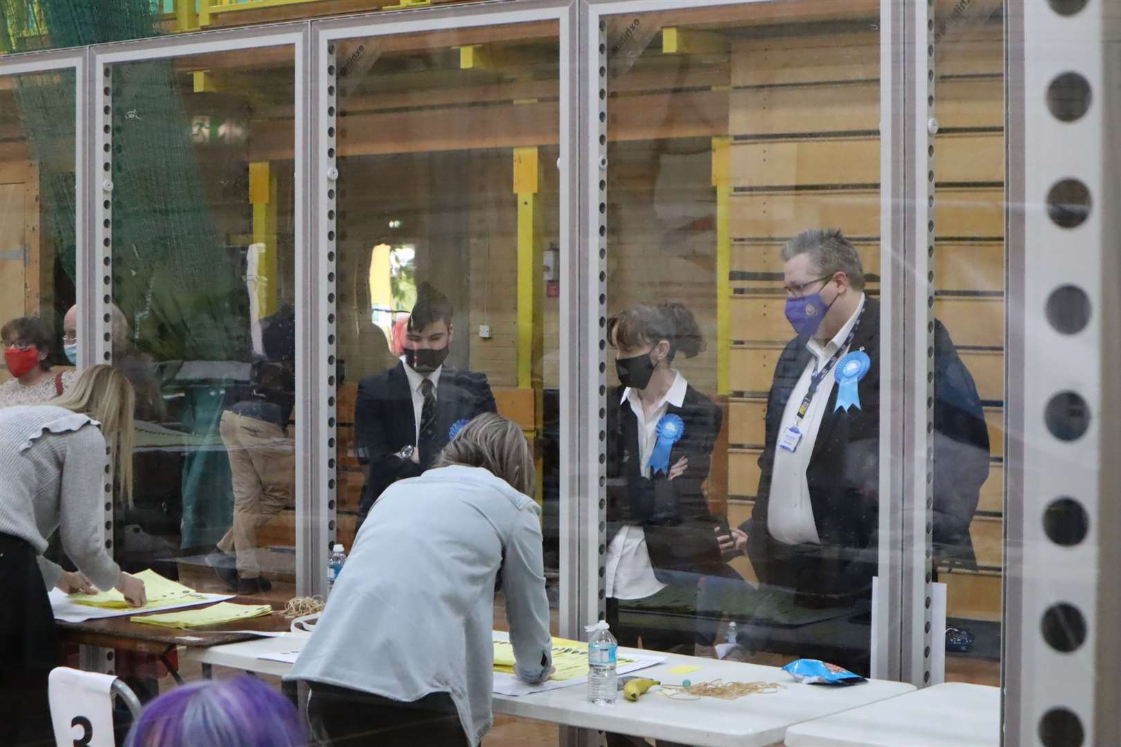 Cameron Beart, Conservative, anxiously watches through the Perspex sheeting as the Sheppey vote is counted for the KCC elections at Swallows Leisure Centre, Sittingbourne