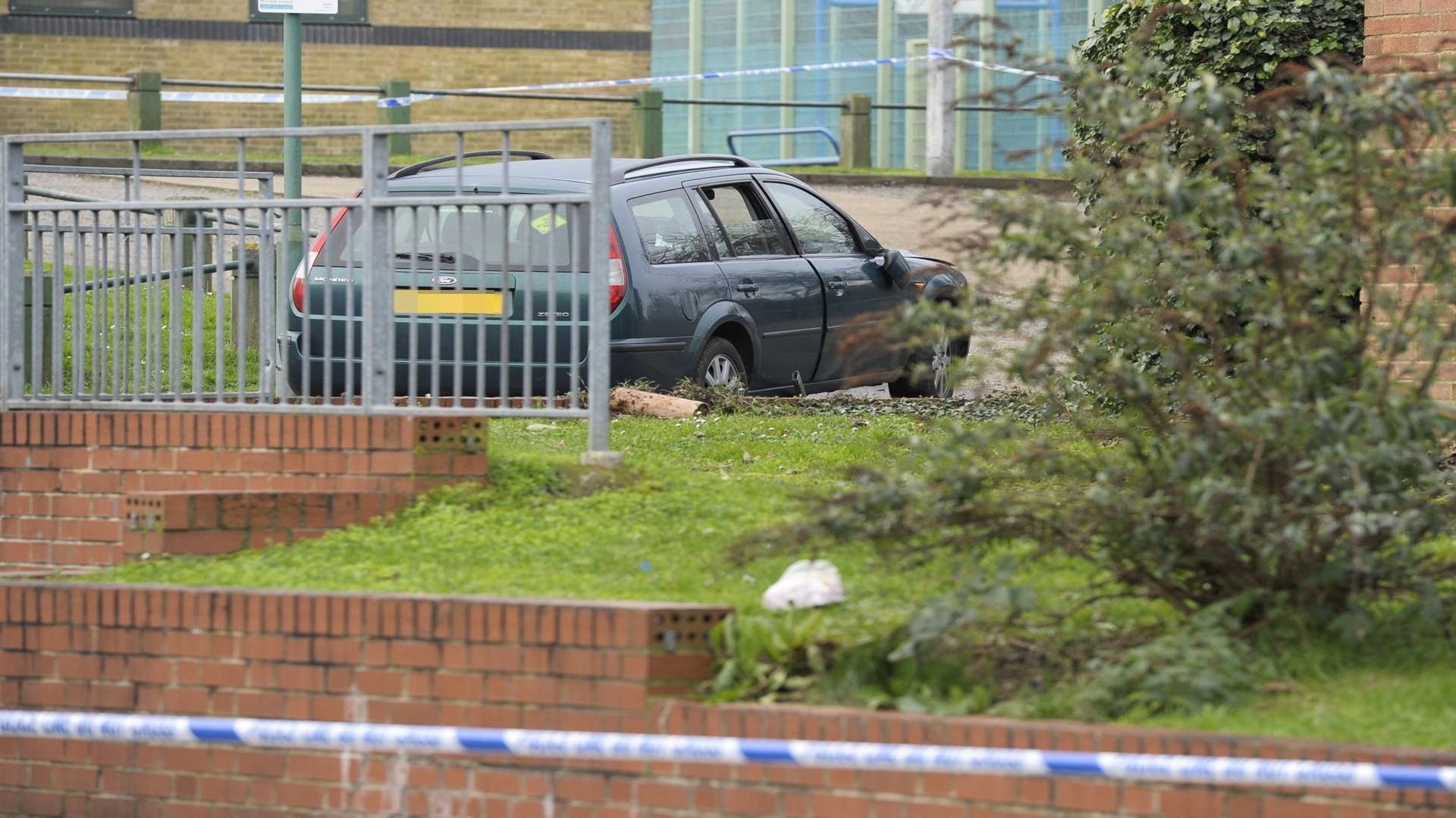 The car mounted a grass verge before hitting a railing. Picture: Andy Payton
