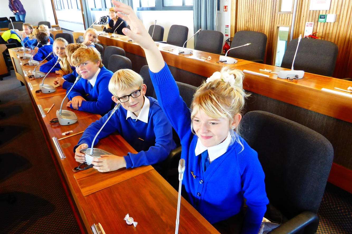 Aiisha Sutton, nine, asks the panel of experts a question on traffic congestion, watched by Harry Wilson, nine, of St Joseph's Catholic Primary School, Broadstairs, at the Thanet launch of the Green Champions initiative held at the Thanet Council chambers