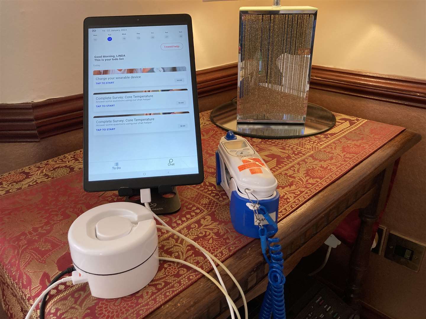 The tablet, charging station and thermometer used on Medway Foundation Trust's "virtual ward" (61950601)