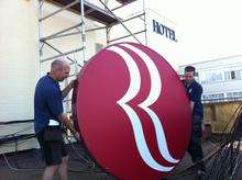 Workmen at the former Ramada Hotel