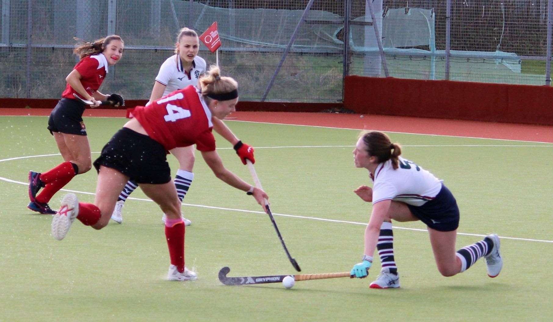 Hattie Jones challenged for the ball as Holcombe Women played Surbiton 2s at Holcombe Park on Sunday Picture: Jon Goodall