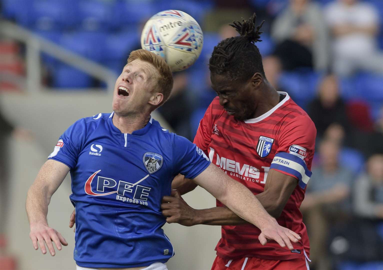A typical aerial challenge in senior football as Eoin Doyle of Oldham and Gillingham's Gabriel Zakuani go head to head in 2018. Picture: Andy Payton
