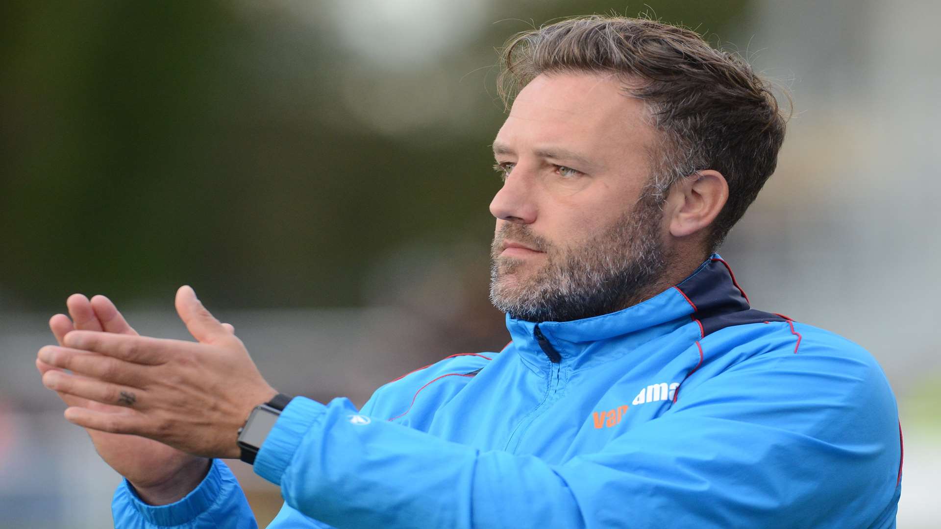 Stones boss Jay Saunders salutes the home support at the final whistle Picture: Gary Browne