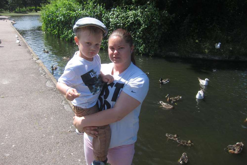Mum Kayleigh Daniel with son Logan at the Herne Bay Memorial Park pond where rats have been attacking ducks