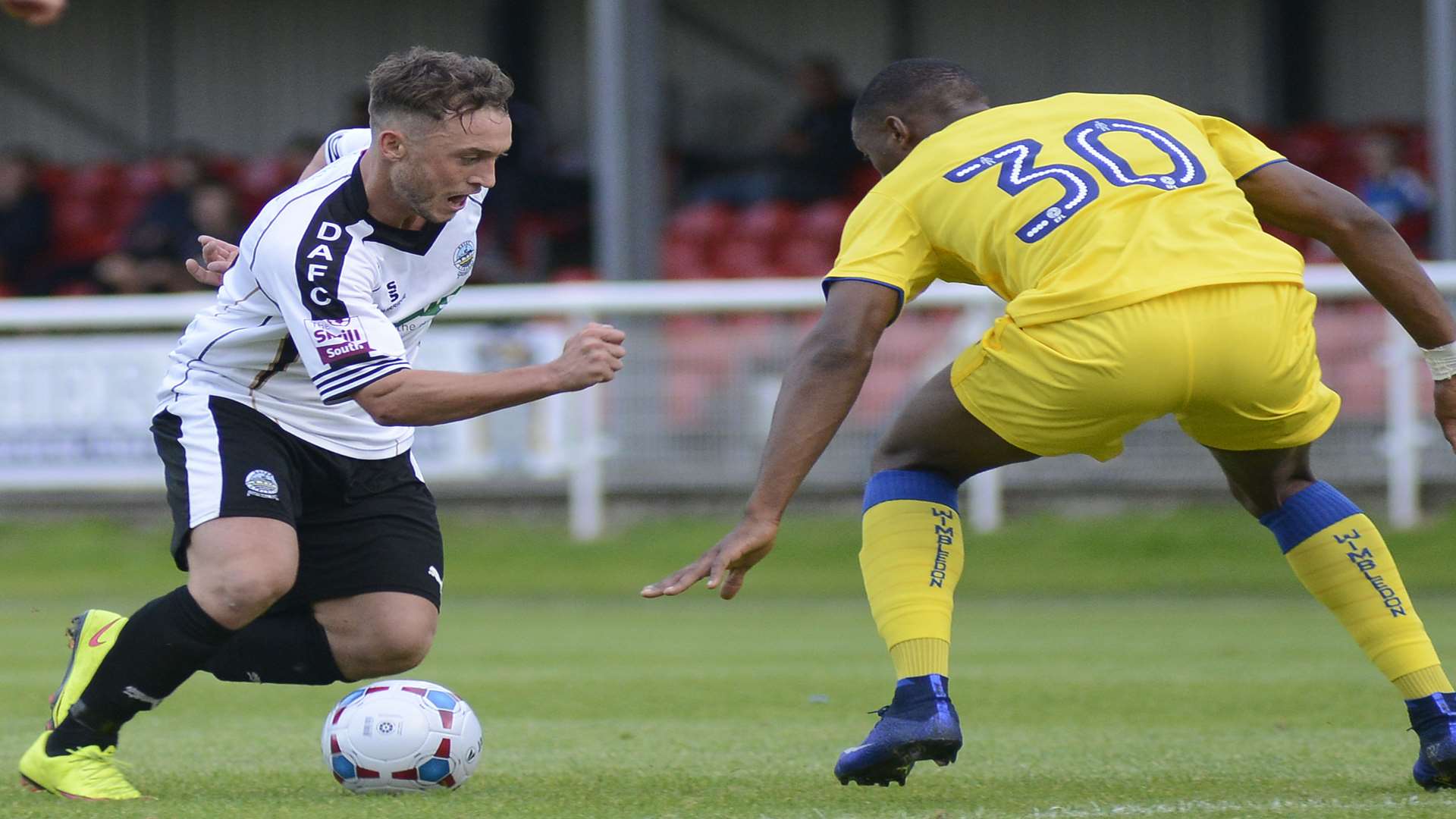 Dover's Ricky Miller takes on the AFC Wimbledon defence during Tuesday's friendly Picture: Paul Amos FM4422976