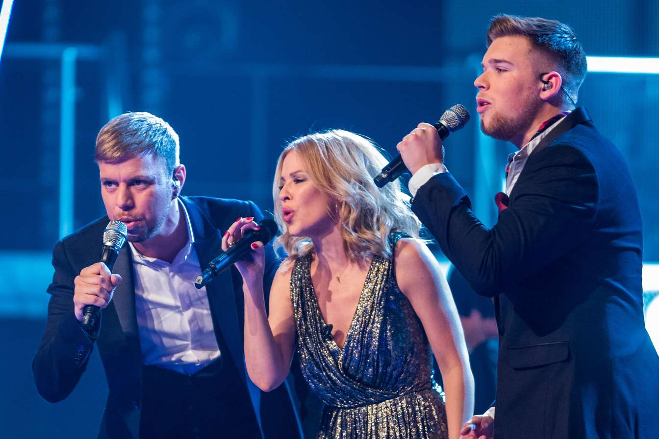 Jamie Johnson singing Into The Blue with Kylie and Lee on The Voice on Saturday March 29. Image courtesy of the BBC.