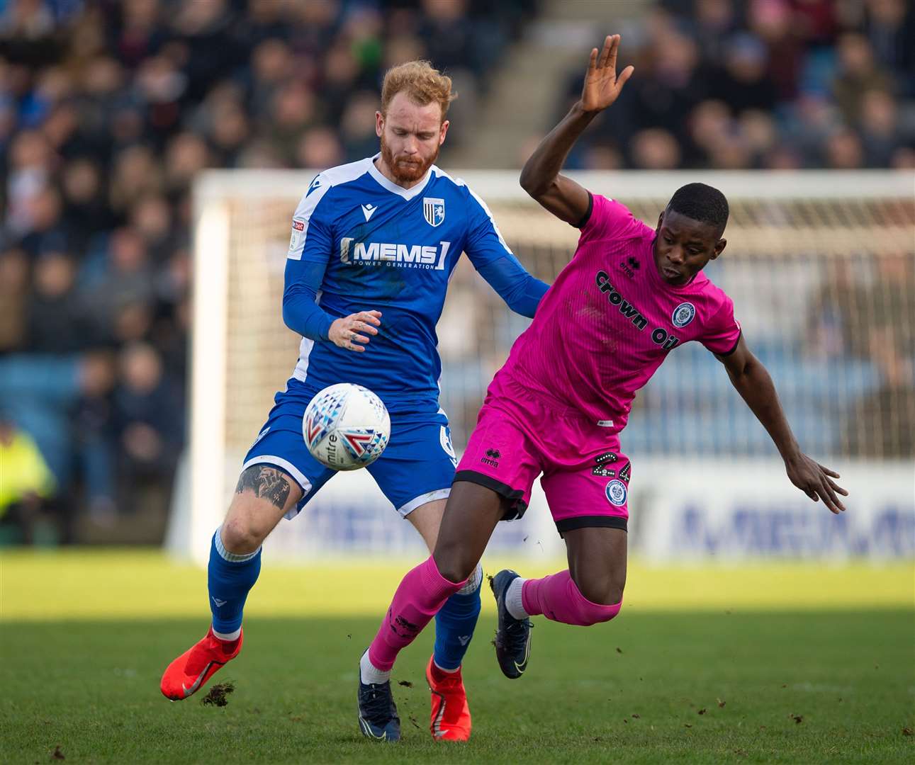 Connor Ogilvie challenges with Rochdale's Kwadwo Baah Picture: Ady Kerry
