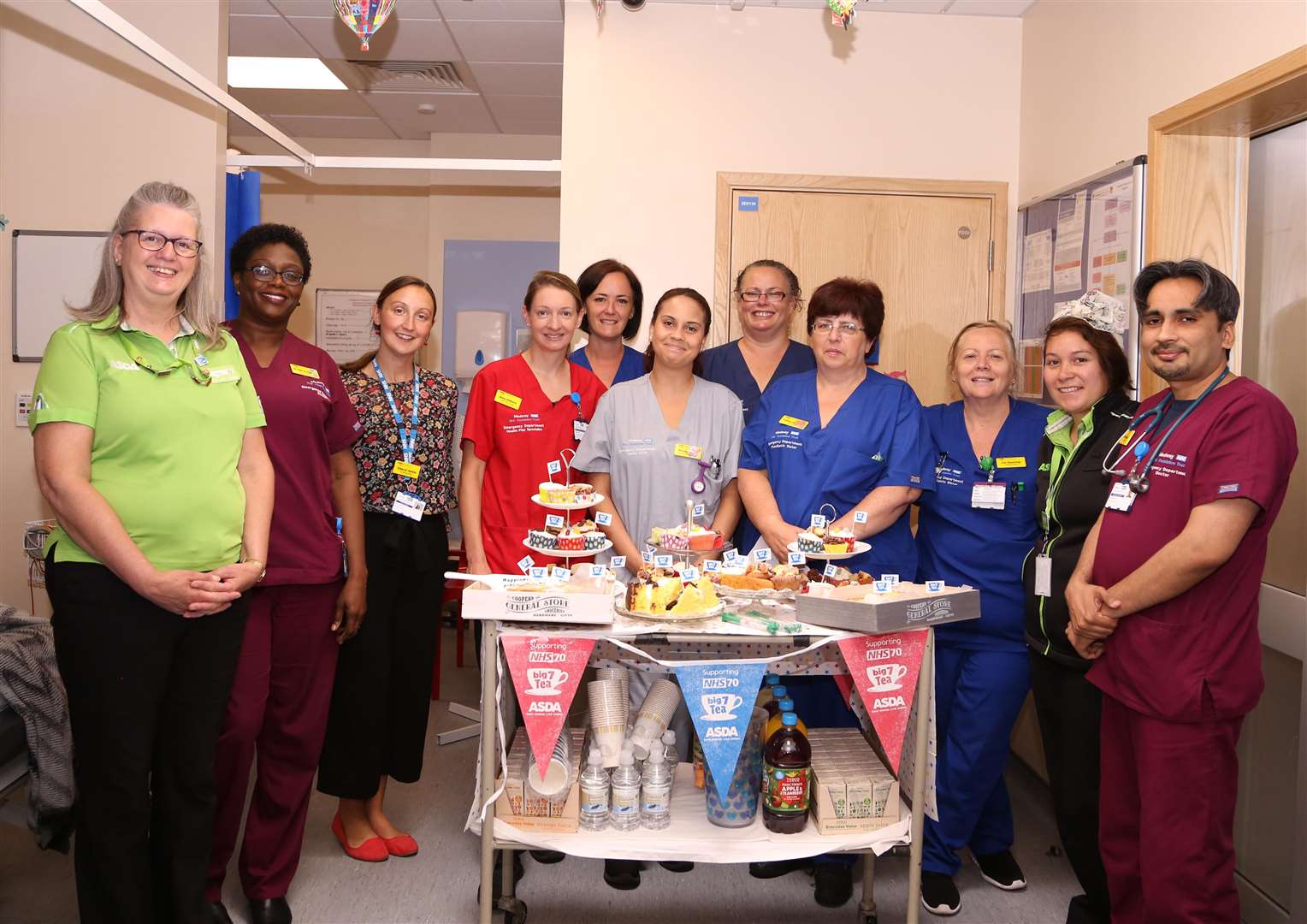 NHS ‘Big7Tea’ party at Medway Maritime Hospital - staff pose with representatives from Asda Gillingham Pier Superstore (2909837)