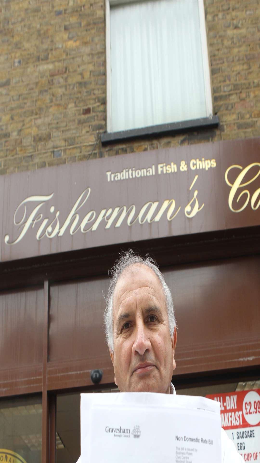 Dev Randhawa, owner of Fisherman's Catch with his tax demand