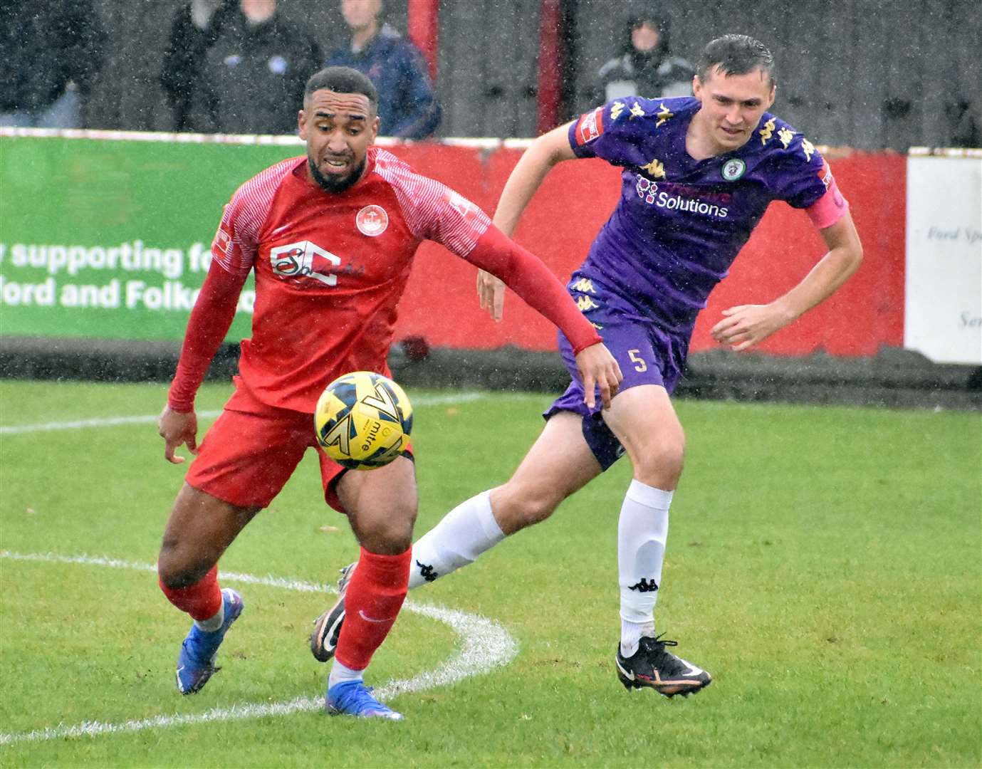 Hythe striker Johan Caney-Bryan in possession against Burgess Hill. Picture: Randolph File