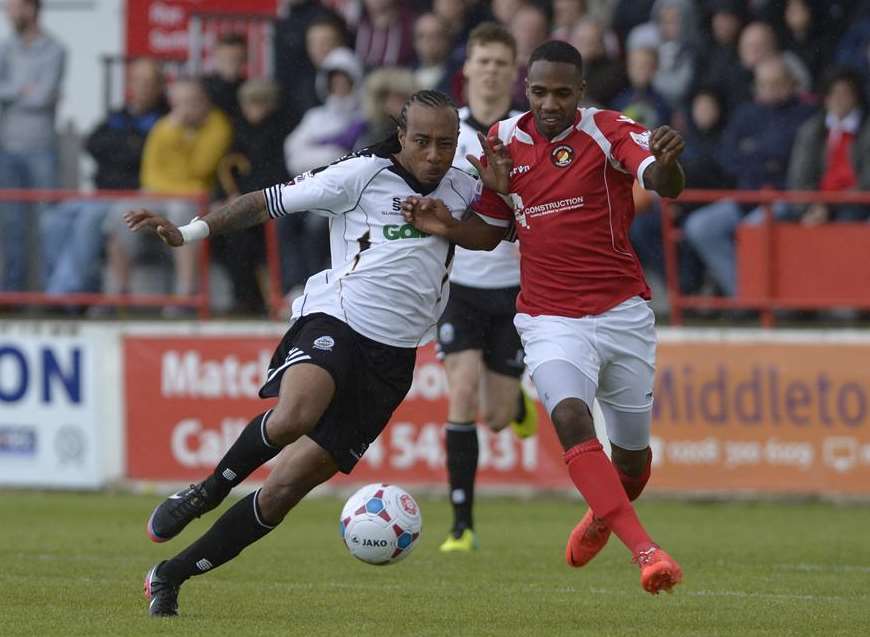 Aiden Palmer tangles with Ricky Modeste in last season's play-off final Picture: Andy Payton