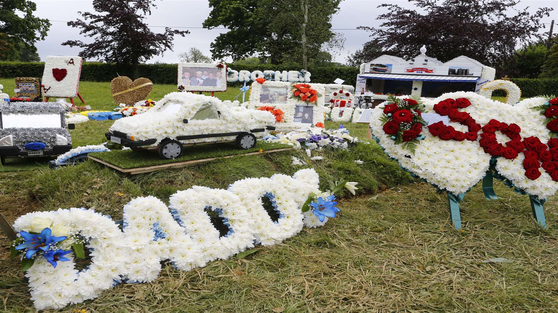 Floral tributes to “Curly Bill” at Cranbrook Cemetery